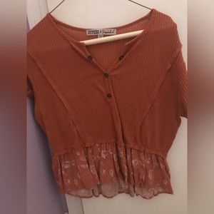 Burnt orange peplum shirt with floral
